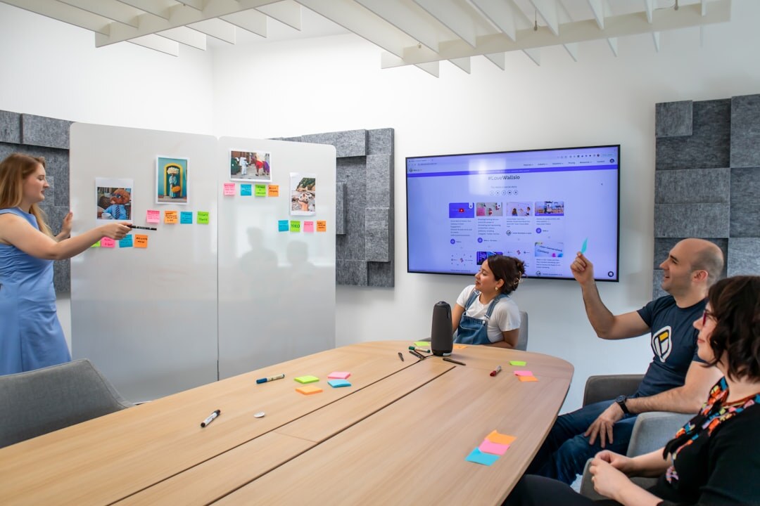 Team presenting digital content strategy on screen