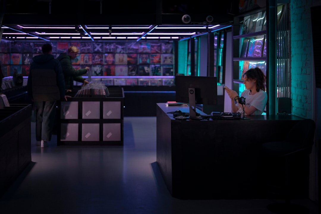 Journalists working in a modern digital newsroom